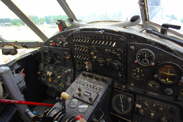 Inside the cockpit of the old plane. Vintage airplane dashboard, close up view