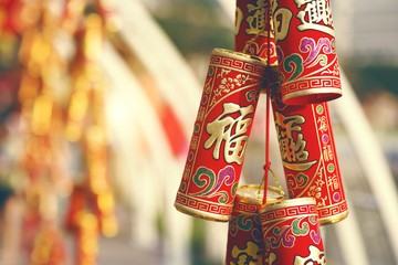 The traditional Chinese golden firecrackers are used to scare aw - obrazy, fototapety, plakaty