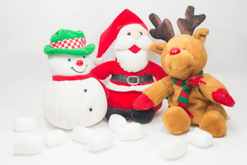 Reindeer doll and Santa doll with snowman doll on white backgrou