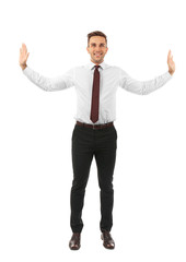 Businessman pushing invisible walls isolated on white