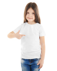 Obraz premium Little girl in blank t-shirt on white background