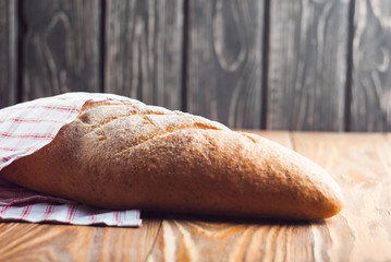 Fresh bread on wood desk. 