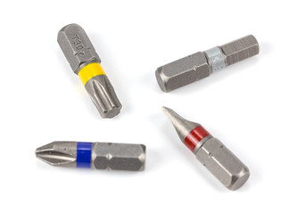 A set of various screwdriver bits isolated on white background