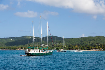 Fototapeta na wymiar Green Three Masted Sailboat