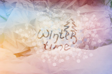 Fototapeta na wymiar Winter time. Paper color texture. Bokeh background.