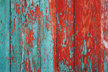 painted wooden fence made of natural wood with old paint