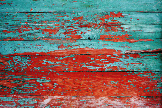 painted wooden fence made of natural wood with old paint