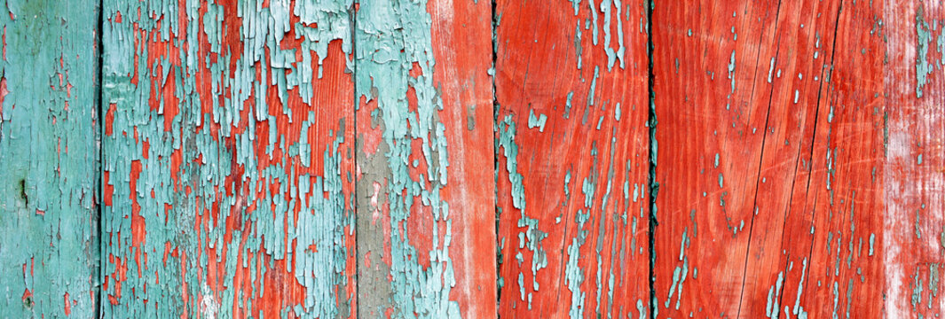 painted wooden fence made of natural wood with old paint