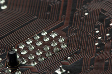 close-up of computer motherboard backside - technology concept.selective focus close up