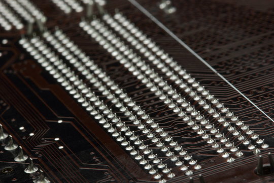 close-up of computer motherboard backside - technology concept.selective focus close up