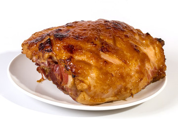 Baked Gammon Covered in Sweet Glaze on White Plate