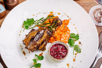 Braised lamb shank with roasted vegetables puree