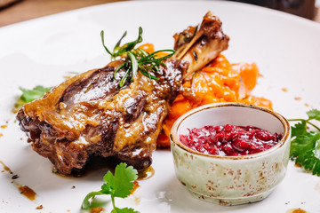 Braised lamb shank with roasted vegetables puree