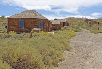 Abandoned dwellings in the 19th Century gold mining ghost town of Bodie, California, a State Historic Park