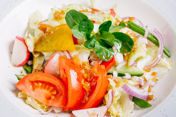 green salad with vegetables, top view, horizontal