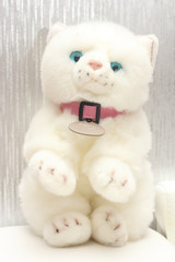 Soft toy fluffy soft white kitty.