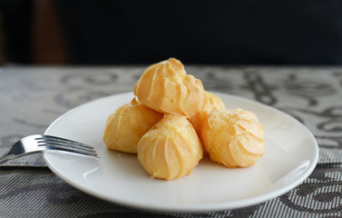 Choux cream France  bakery ,Profiteroles, choux with a custard cream, creme anglaise, whipped cream, dessert