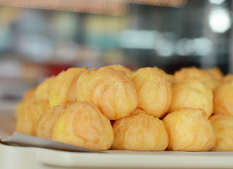 Choux cream France  bakery ,Profiteroles, choux with a custard cream, creme anglaise, whipped cream, dessert