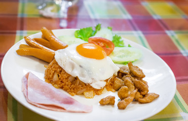  American breakfast style.American fried rice with egg and sausage, American breakfast style.