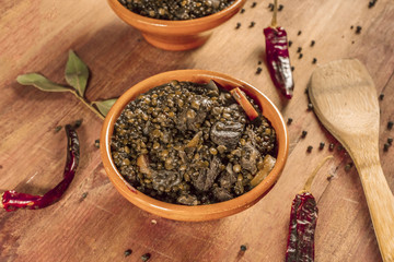 Lentil stew, shot with bay leaves and chili peppers