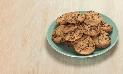Chocolate chips cookies on plate with copyspace