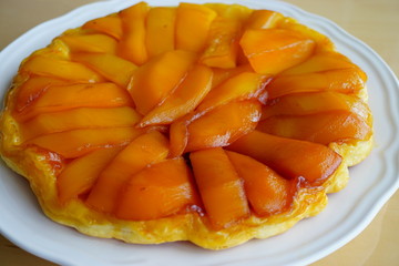 An upside-down mango tarte tatin cake