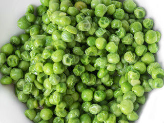 green peas in a white bowl