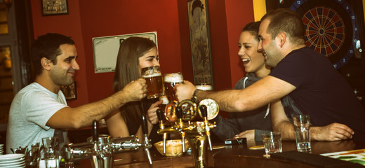 Friends having drinks in a bar