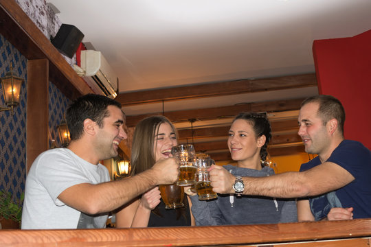 Friends having drinks in a bar