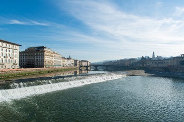 Fototapeta premium Arno river weir in Florence, Italy