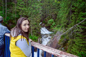 Female tourist on the mountain trail