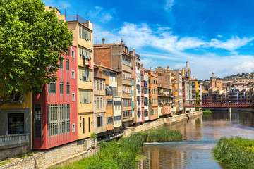Fototapeta premium Colorful houses and Eiffel bridge in Girona