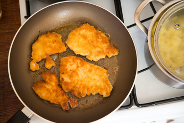 fried pork chops in the pan