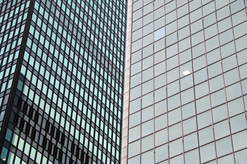 Midtown Manhattan NYC intersecting high-rise buildings architectural background