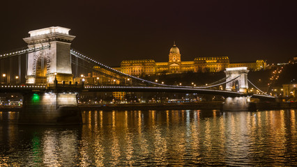 Fototapeta na wymiar Night winter view of Chain Bridge with Castle in background, Budapest, Hungary