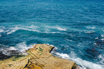 Fisherman by the sea