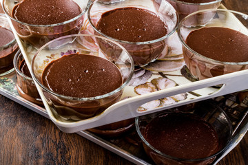 Homemade Chocolate Puddings in glass cups.