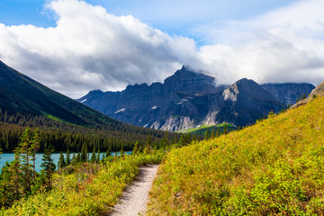 Grinnell Glacier Trail is a long, strenuous, and scenic path leading past three beautiful lakes to...