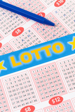 Lotto ticket gambling with pen, ticket is mock-up