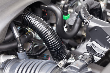 Car engine wiring and cable detail close-up