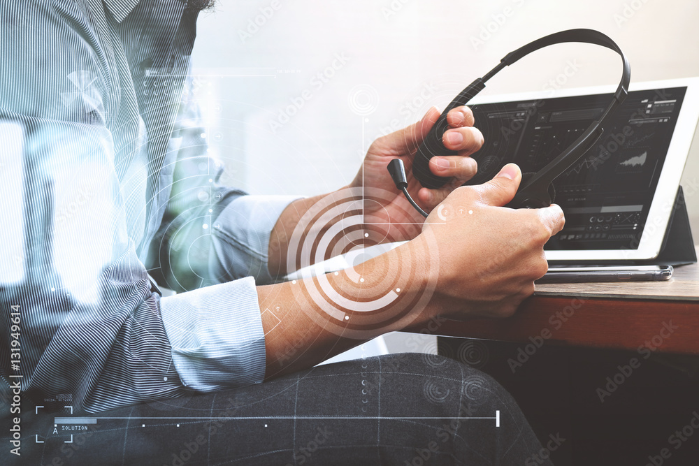 Poster business man using VOIP headset with digital tablet computer doc