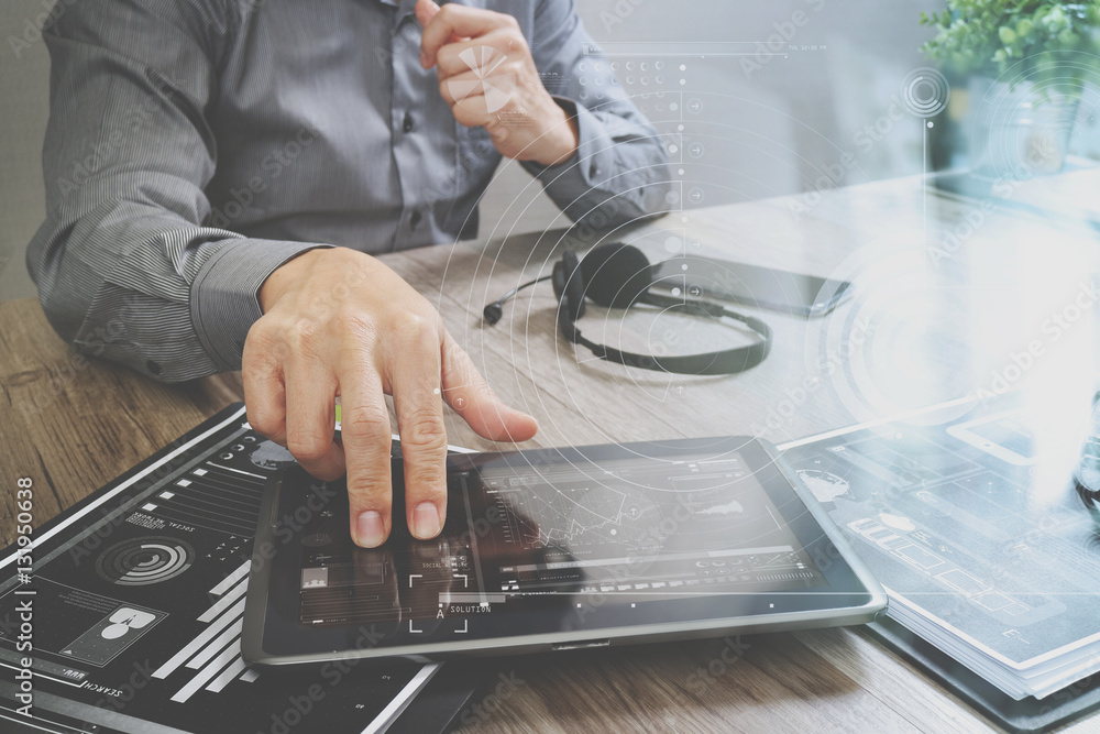 Poster businessman hand using voip headset with digital tablet computer