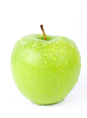 Juicy green apple isolated on white in studio - XXL file with selective focus.