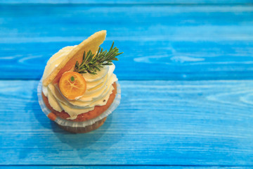 cupcakes on a blue wooden background