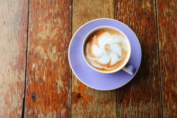 coffee cappuccino on wooden table Top view