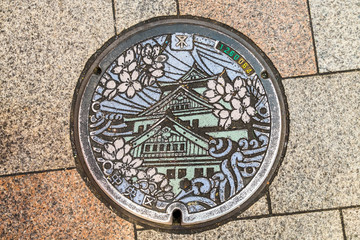 OSAKA, JAPAN - NOV 21, 2016: Decorative manhole cover in Osaka.