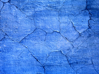 vintage blue wall as background with artistic shadows added