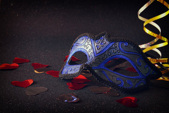 elegant venetian, mardi gras mask on glitter background