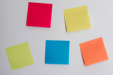 colorful sticky notes on a horizontal white background