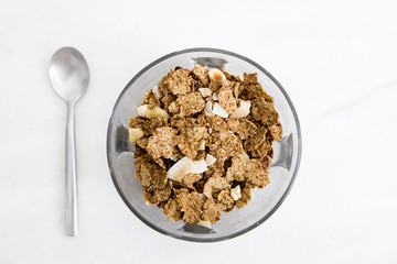 top view of a cup of whole grains with the spoon